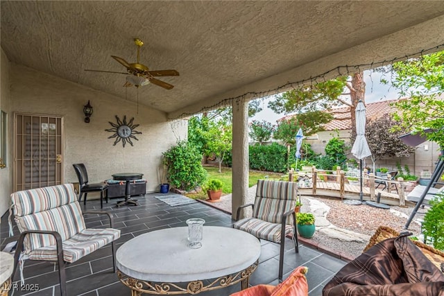 3938 Redfield Ave, North Las Vegas, NV 89032 - view of patio / terrace with a ceiling fan and an outdoor hangout area