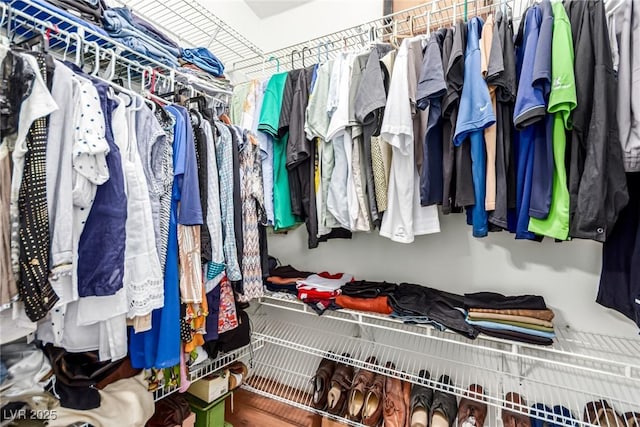 3938 Redfield Ave, North Las Vegas, NV 89032 - walk in closet with wood finished floors