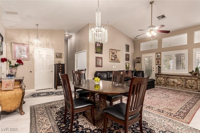 3938 Redfield Ave, North Las Vegas, NV 89032 - dining room with a chandelier, a ceiling fan, and high vaulted ceiling