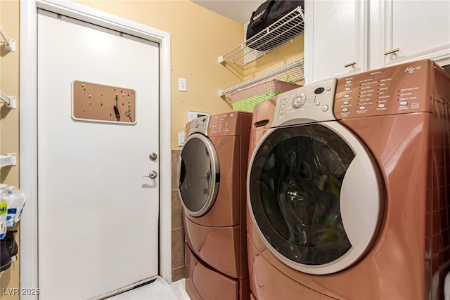 3938 Redfield Ave, North Las Vegas, NV 89032 - laundry room featuring cabinet space and washer and dryer