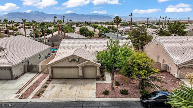 6125 Resort Ridge St, Las Vegas, NV 89130 - aerial perspective of suburban area featuring a mountain backdrop