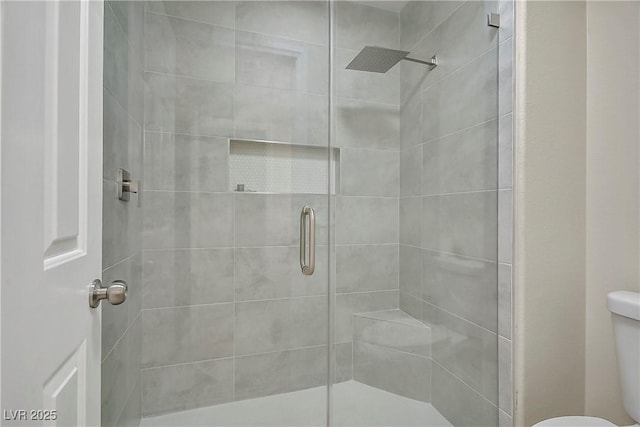 6125 Resort Ridge St, Las Vegas, NV 89130 - bathroom featuring a shower stall and toilet