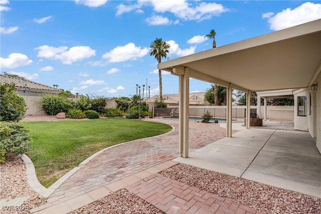 6125 Resort Ridge St, Las Vegas, NV 89130 - fenced backyard featuring a patio