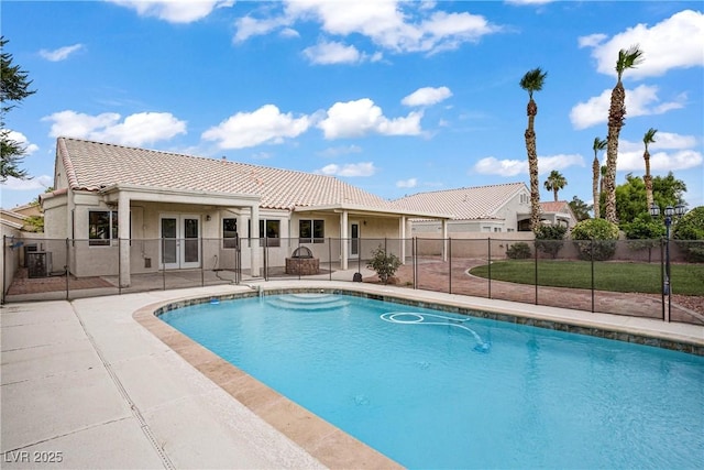 6125 Resort Ridge St, Las Vegas, NV 89130 - view of swimming pool featuring french doors and a patio area