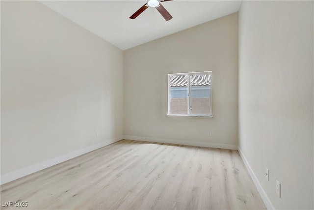 6125 Resort Ridge St, Las Vegas, NV 89130 - unfurnished room with vaulted ceiling, ceiling fan, and light wood-style floors