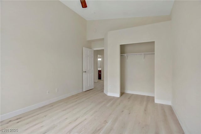6125 Resort Ridge St, Las Vegas, NV 89130 - unfurnished bedroom featuring wood finished floors, lofted ceiling, a closet, and ceiling fan