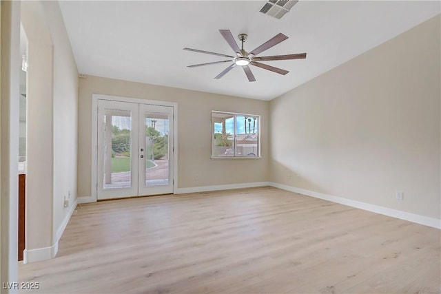 6125 Resort Ridge St, Las Vegas, NV 89130 - empty room with french doors, light wood-type flooring, and a ceiling fan