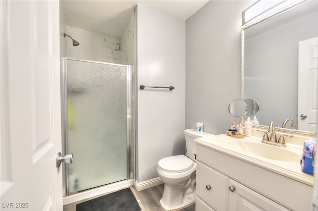 1500 Hialeah Dr Unit C, Las Vegas, NV 89119 - full bathroom with a shower stall, vanity, and wood finished floors