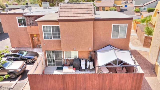 1500 Hialeah Dr Unit C, Las Vegas, NV 89119 - rear view of house featuring stucco siding