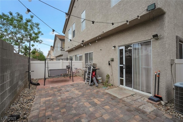 6388 Extreme Shear Ave Unit 103, Henderson, NV 89011 - fenced backyard with a patio and a grill