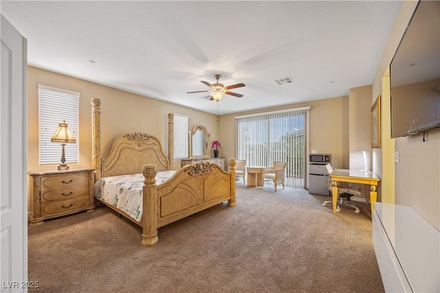 1084 Via Della Costrella, Henderson, NV 89011 - bedroom featuring carpet flooring, a desk, and a ceiling fan