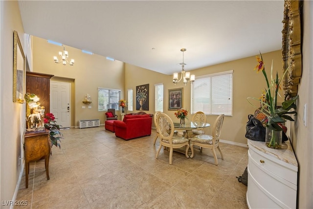 1084 Via Della Costrella, Henderson, NV 89011 - dining space featuring a chandelier and light tile patterned floors