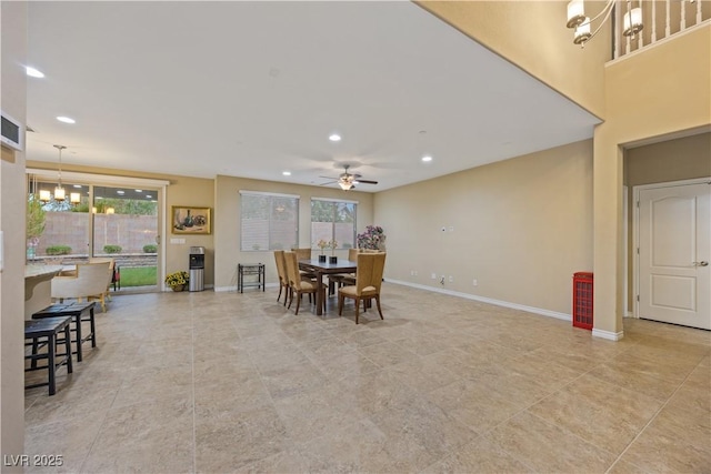 1084 Via Della Costrella, Henderson, NV 89011 - dining room featuring a ceiling fan, recessed lighting, healthy amount of natural light, light tile patterned floors, and a chandelier