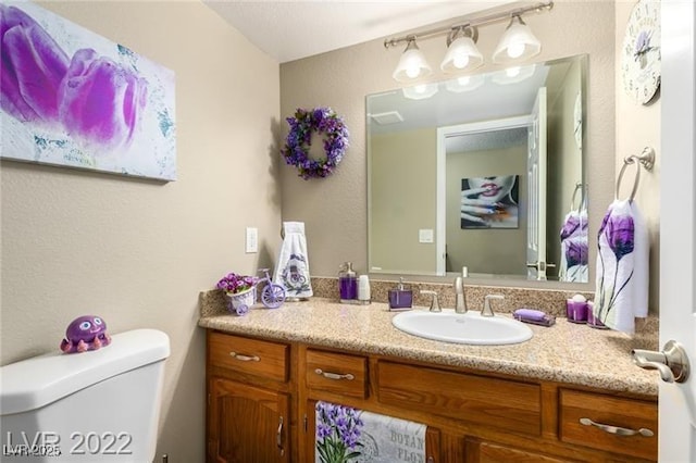 3393 Narod St, Las Vegas, NV 89121 - bathroom featuring vanity and toilet