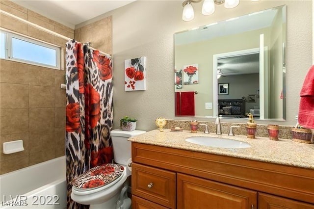 3393 Narod St, Las Vegas, NV 89121 - bathroom with connected bathroom, vanity, shower / bath combo with shower curtain, and ceiling fan
