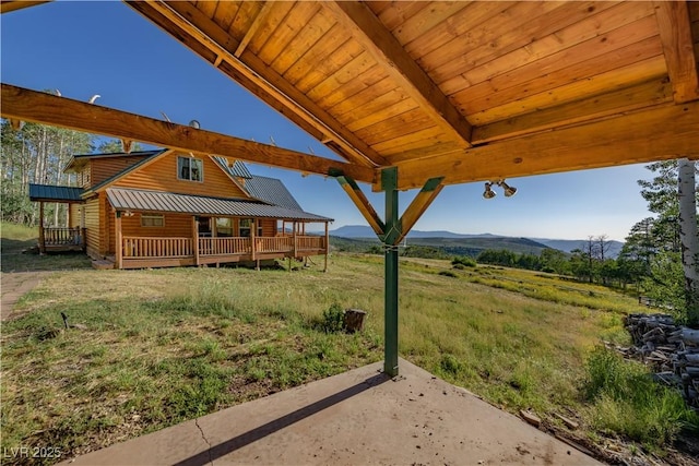 1458 W 6400 S, Cedar City, UT 84720 - view of yard featuring a mountain view and a porch