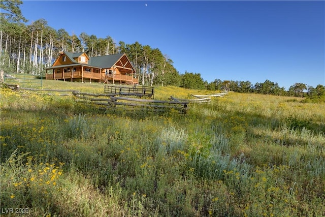 1458 W 6400 S, Cedar City, UT 84720 - rear view of house featuring a wooden deck and a view of rural / pastoral area