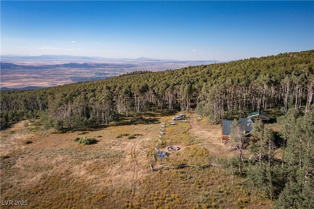 1458 W 6400 S, Cedar City, UT 84720 - aerial view of property and surrounding area featuring a heavily wooded area and mountains
