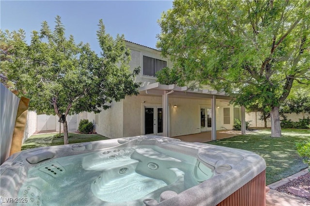 7629 Oyster Cove Dr, Las Vegas, NV 89128 - back of house with french doors, a hot tub, and stucco siding