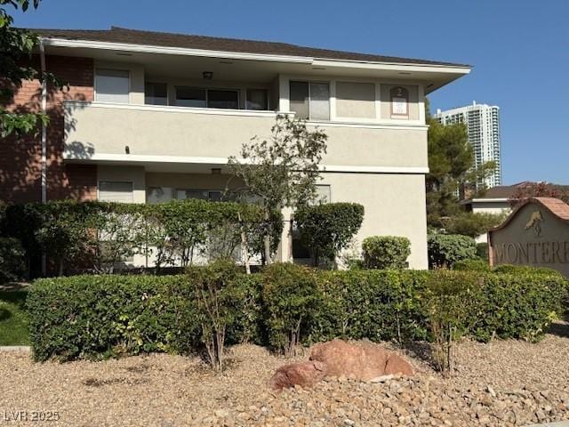 793 Oakmont Ave Unit 202, Las Vegas, NV 89109 - rear view of house featuring stucco siding