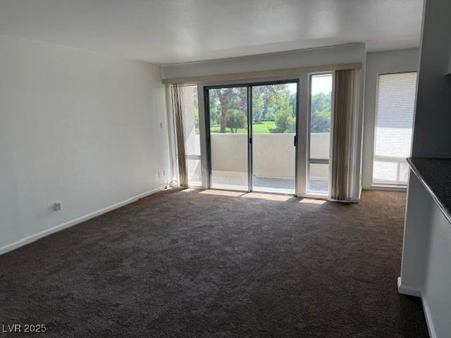 793 Oakmont Ave Unit 202, Las Vegas, NV 89109 - unfurnished room featuring dark colored carpet