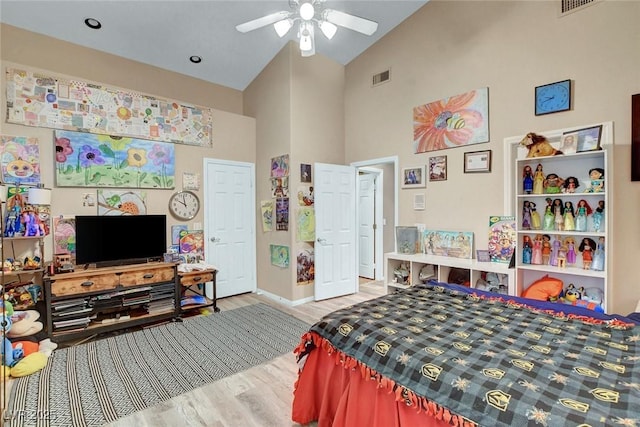 9553 Gainey Ranch Ave, Las Vegas, NV 89147 - bedroom featuring wood finished floors, high vaulted ceiling, and a ceiling fan