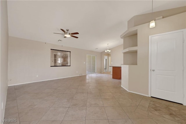 1770 W Charleston Park Ave, Pahrump, NV 89048 - unfurnished living room with vaulted ceiling, a ceiling fan, and light tile patterned flooring