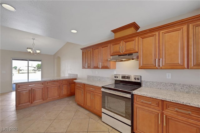 1770 W Charleston Park Ave, Pahrump, NV 89048 - kitchen featuring stainless steel electric stove, under cabinet range hood, a chandelier, vaulted ceiling, and brown cabinetry