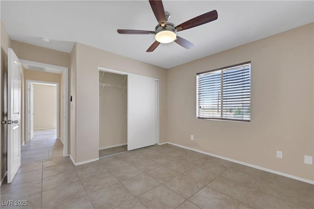 1770 W Charleston Park Ave, Pahrump, NV 89048 - unfurnished bedroom with a closet, light tile patterned floors, and ceiling fan