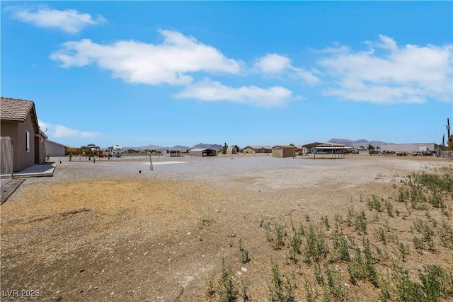 1770 W Charleston Park Ave, Pahrump, NV 89048 - view of yard with a mountain view