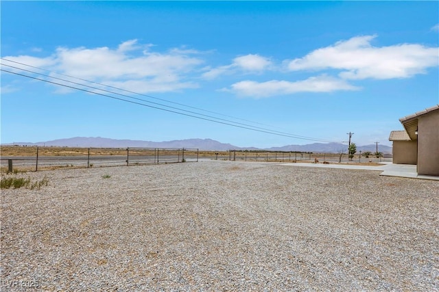 1770 W Charleston Park Ave, Pahrump, NV 89048 - view of yard featuring a mountain view