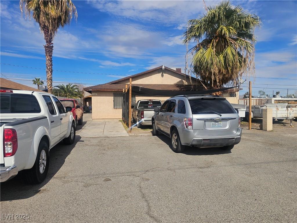 1608 Putnam Ave, North Las Vegas, NV 89030 - view of front of property featuring stucco siding