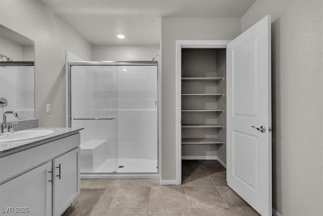 487 Via Renata, Henderson, NV 89044 - bathroom with vanity, a stall shower, and recessed lighting