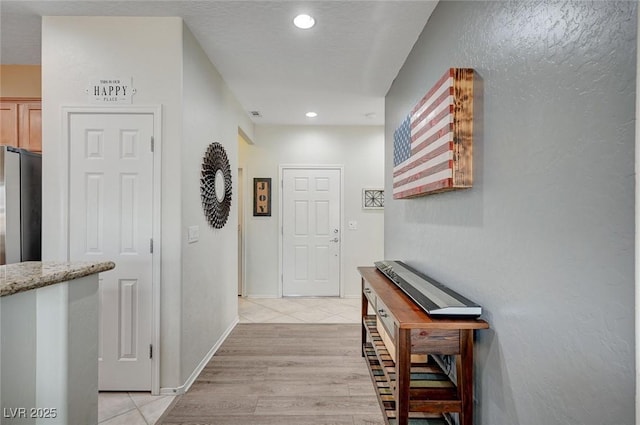 7460 Chaffinch St, North Las Vegas, NV 89084 - foyer with recessed lighting and light tile patterned floors
