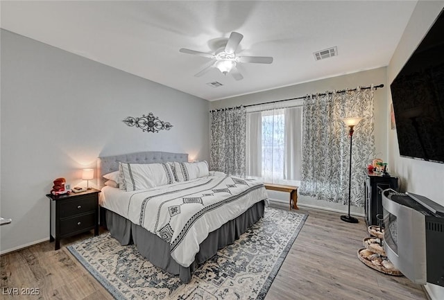 7460 Chaffinch St, North Las Vegas, NV 89084 - bedroom featuring wood finished floors and a ceiling fan