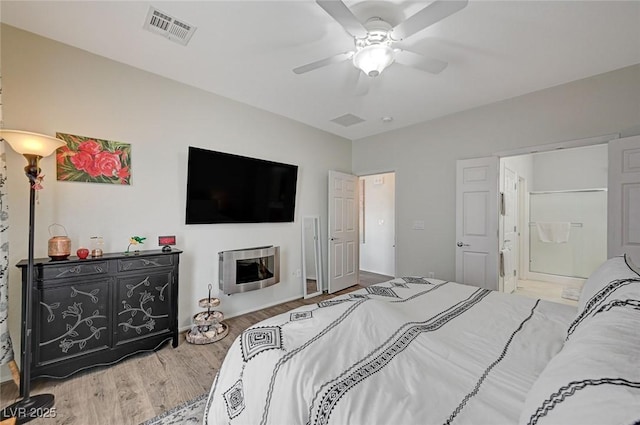 7460 Chaffinch St, North Las Vegas, NV 89084 - bedroom featuring wood finished floors and ceiling fan