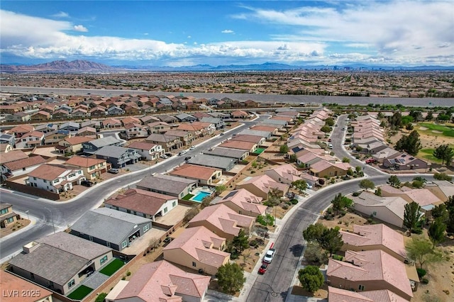 7460 Chaffinch St, North Las Vegas, NV 89084 - aerial view of residential area featuring a mountainous background