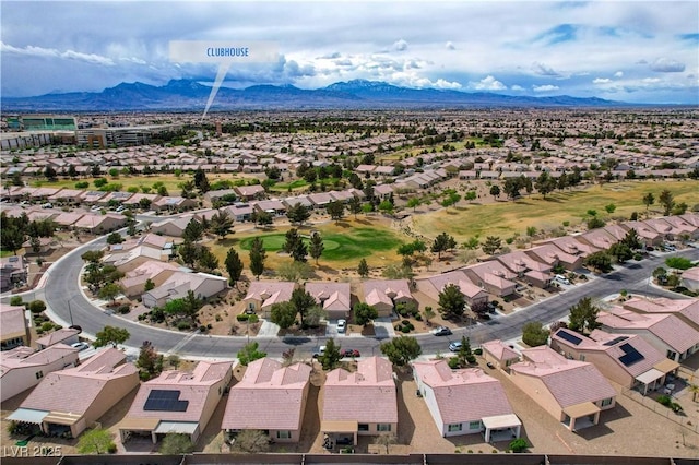 7460 Chaffinch St, North Las Vegas, NV 89084 - aerial perspective of suburban area with a mountainous background