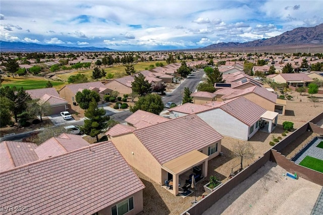 7460 Chaffinch St, North Las Vegas, NV 89084 - aerial view of residential area with a mountainous background