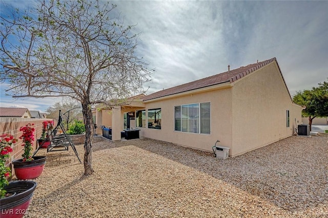 7460 Chaffinch St, North Las Vegas, NV 89084 - rear view of property with stucco siding