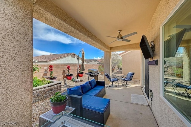 7460 Chaffinch St, North Las Vegas, NV 89084 - fenced backyard with a patio, ceiling fan, and an outdoor living space