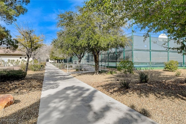 7460 Chaffinch St, North Las Vegas, NV 89084 - surrounding community featuring a tennis court