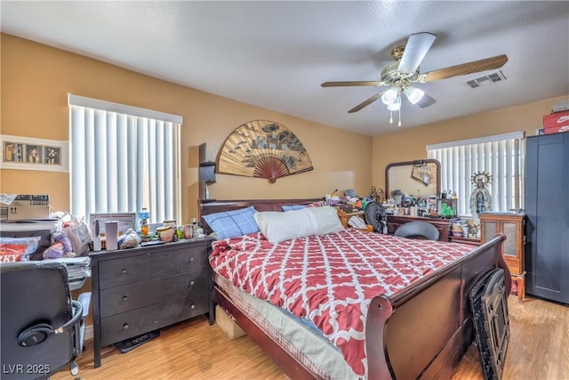 111 Narcissus Ln, Las Vegas, NV 89107 - bedroom featuring light wood-type flooring and ceiling fan