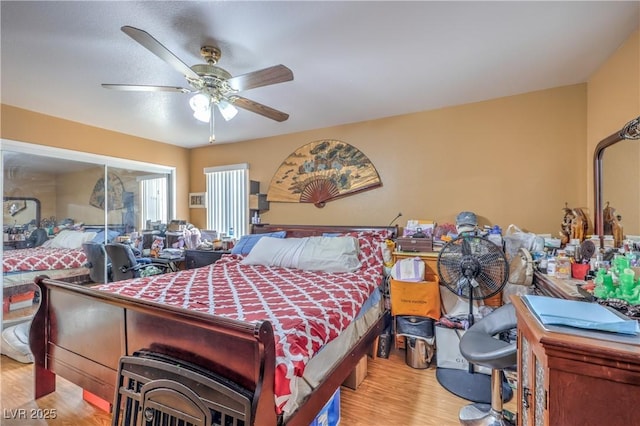 111 Narcissus Ln, Las Vegas, NV 89107 - bedroom with wood finished floors and a ceiling fan
