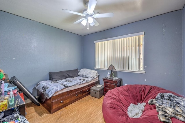 111 Narcissus Ln, Las Vegas, NV 89107 - bedroom with wood finished floors and a ceiling fan