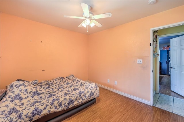 111 Narcissus Ln, Las Vegas, NV 89107 - bedroom with wood finished floors and ceiling fan