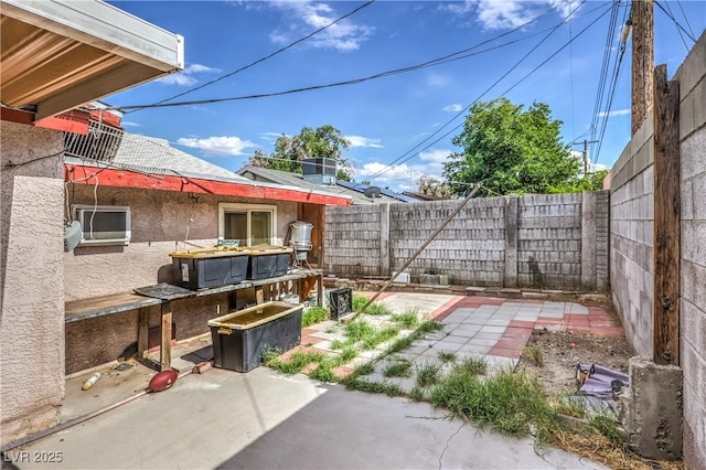 111 Narcissus Ln, Las Vegas, NV 89107 - fenced backyard with a patio