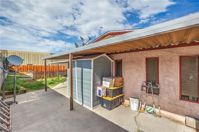 111 Narcissus Ln, Las Vegas, NV 89107 - view of patio featuring a storage shed