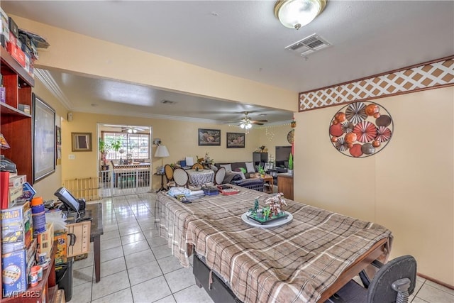 111 Narcissus Ln, Las Vegas, NV 89107 - dining area featuring light tile patterned floors, crown molding, and a ceiling fan