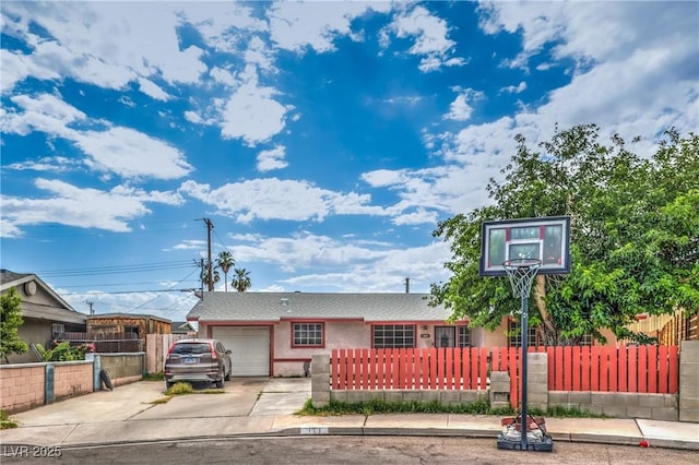 111 Narcissus Ln, Las Vegas, NV 89107 - view of front of property with driveway, a garage, and stucco siding